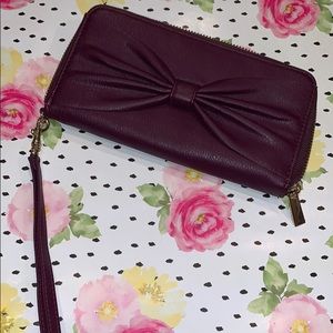 Plum Bow wristlet 💕